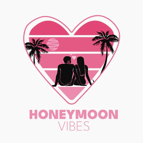 Silhouette of couple sitting on beach at sunset with palm trees inside heart shape, honeymoon vibes text