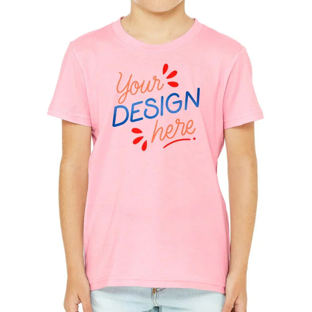 Child wearing pink youth t-shirt with "Your Design Here" text on front, styled for custom printing